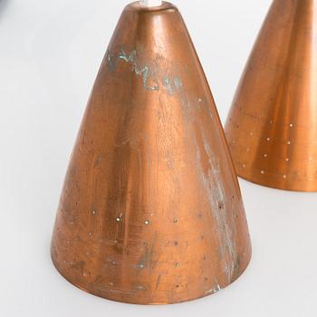 A 1960s three-shade copper and wood pendant ceiling light.