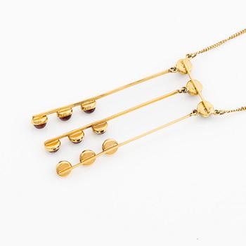 Pendant with chain in 18K gold set with cabochon-cut garnets, HK.