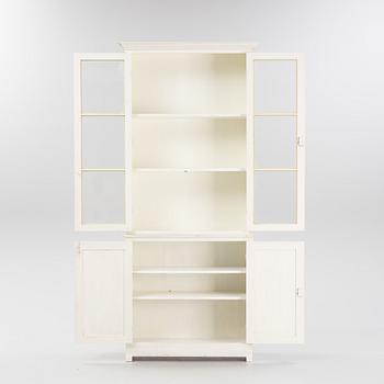 A painted book cabinet, 21st century.