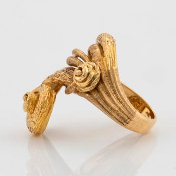 An 18K gold Ilias Lalaounis ring.