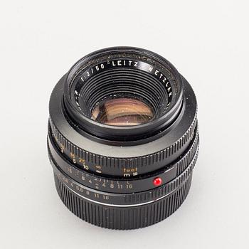 A chrome Leicaflex SL / Leica no 1198668 (1968) and two lenses.