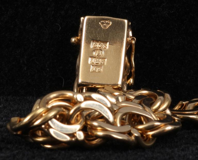 ARMBAND, 18K guld. 36 gram.