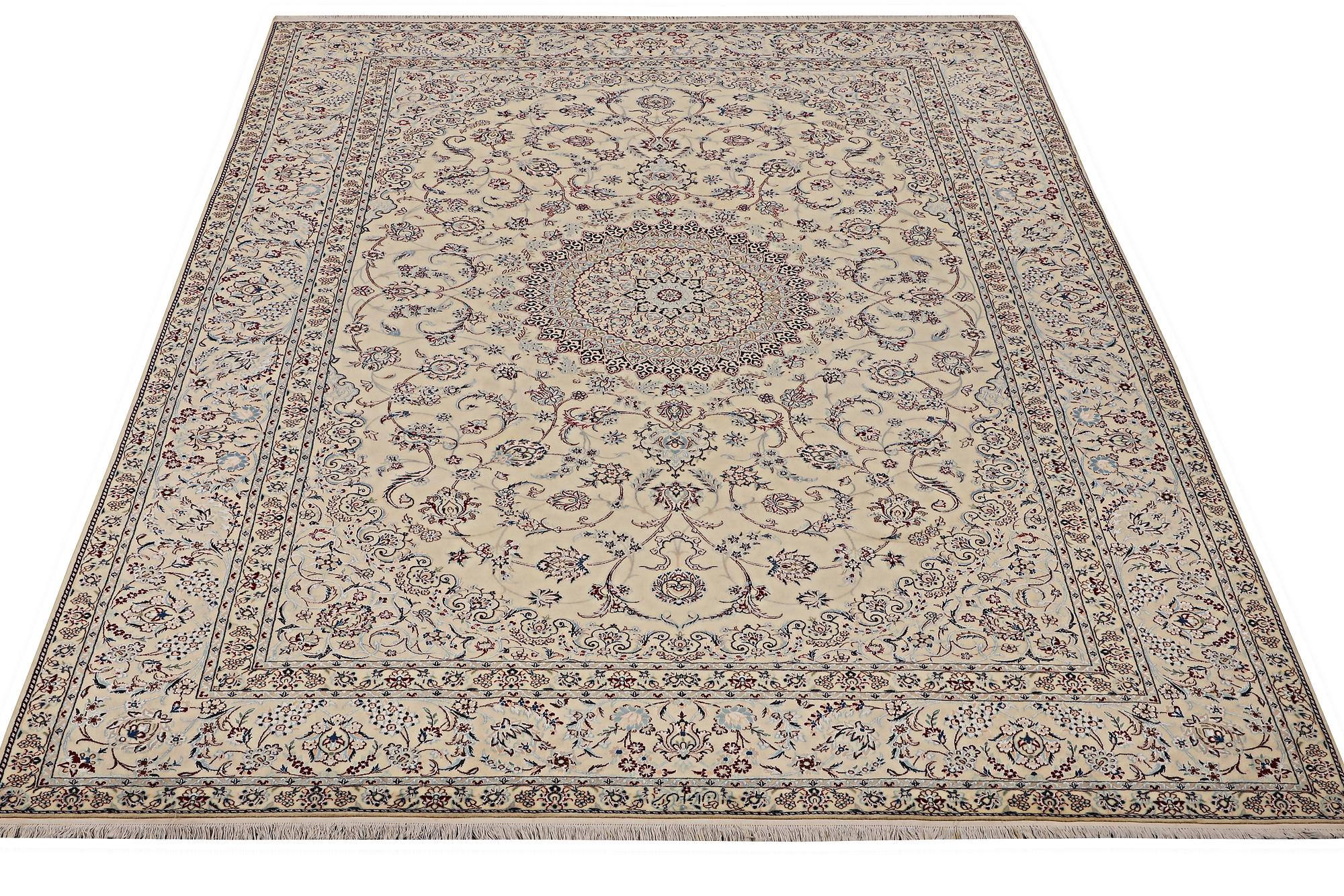 A Nain carpet, part silk, signed, 6 laa, c. 295 x 205 cm.