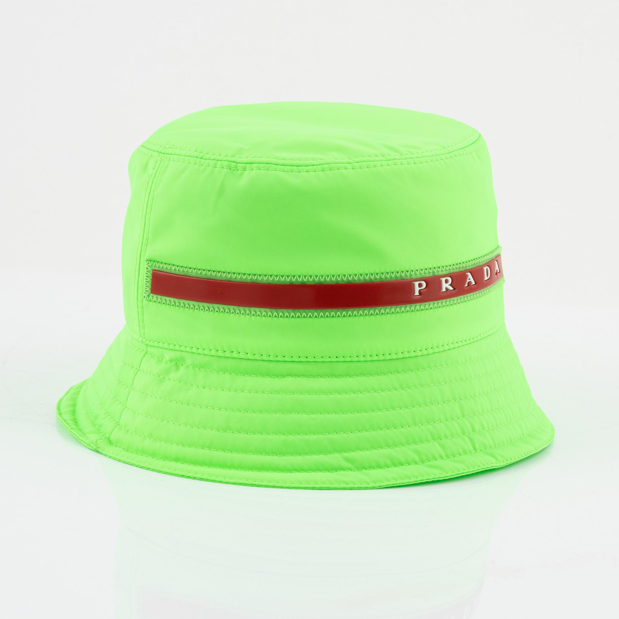 Prada a neon green bucket hat size S. Bukowskis