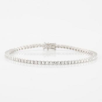 Tennis bracelet 18K white gold with octagon-cut diamonds.