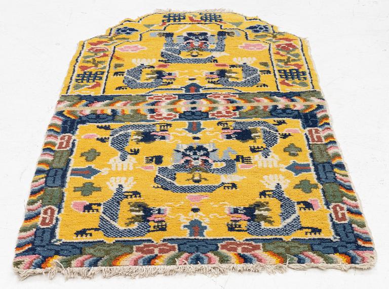 A semi-antique chinese throne back rug, c 145 x 72 cm.