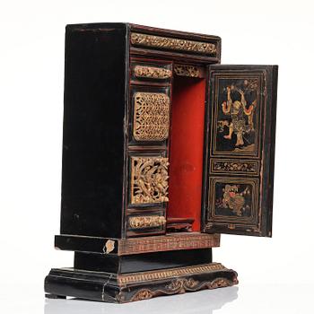 A Chinese altar cabinet, Qing dynasty, 19th Century.