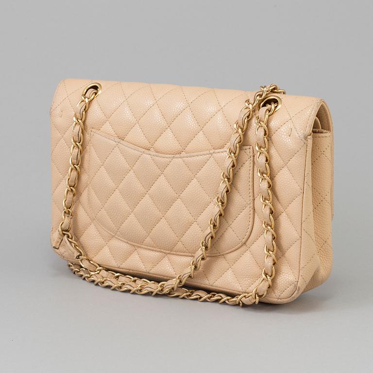 A "double flap-bag medium" by Chanel, 2010-2011.