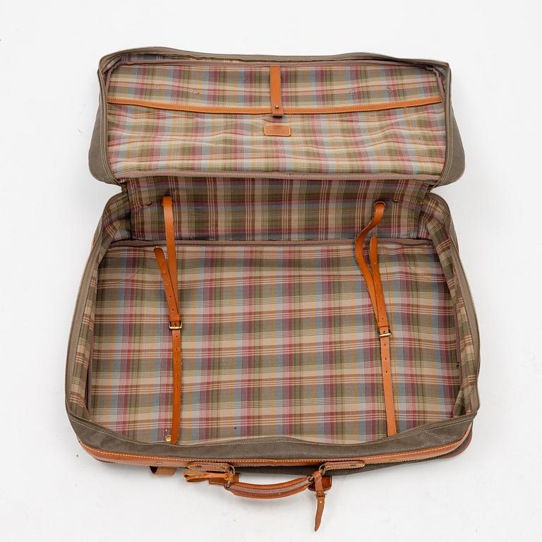 Mulberry, a scotch grain suitcase.