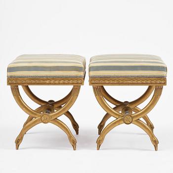 A pair of late Gustavian stools attributed to E. Ståhl (master in Stockholm 1794-1820).