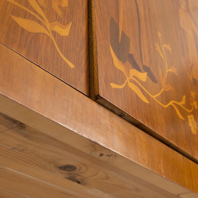 Erik Matsson, a walnut-veneered cabinet, Mjölby Intarsia, 1940's/50's.