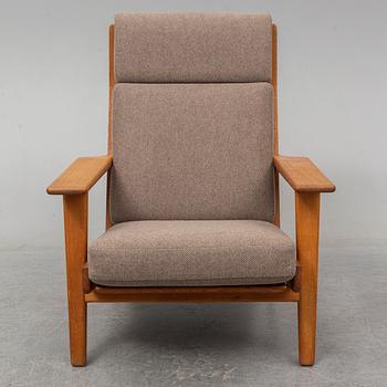 HANS J WEGNER, an oak 'GE-290' easy chair from Getama, Denmark.