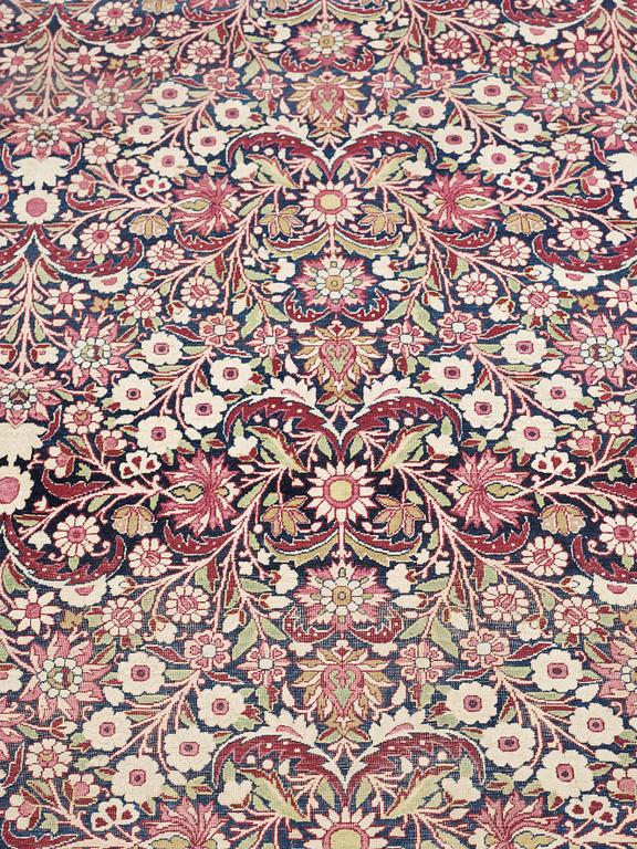 SEMI-ANTIQUE KERMAN LAVAR. 348 x 344 cm.