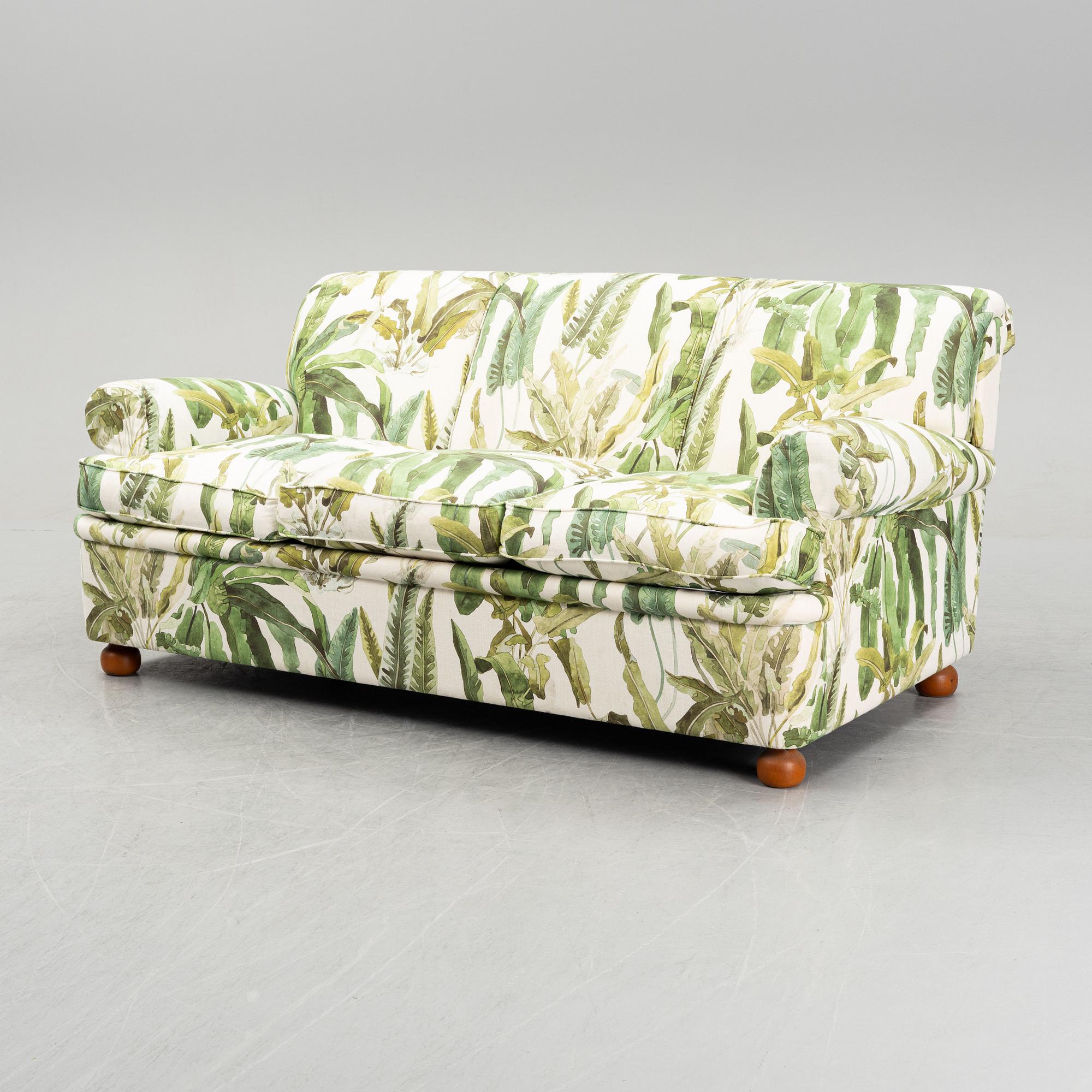 A model 703 sofa by Josef Frank for Firma Svenskt Tenn.