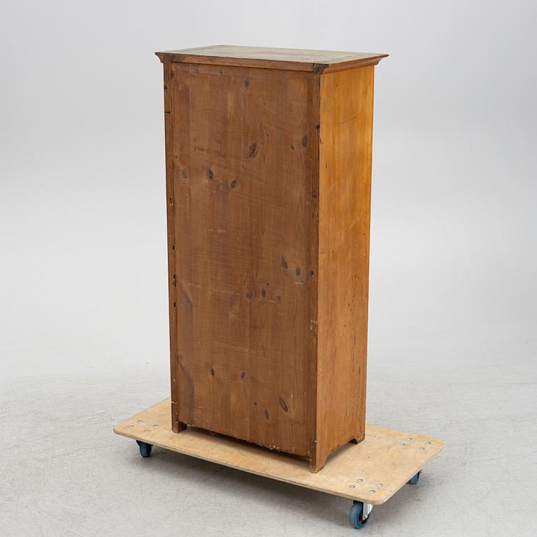 A cabinet, circa 1900.