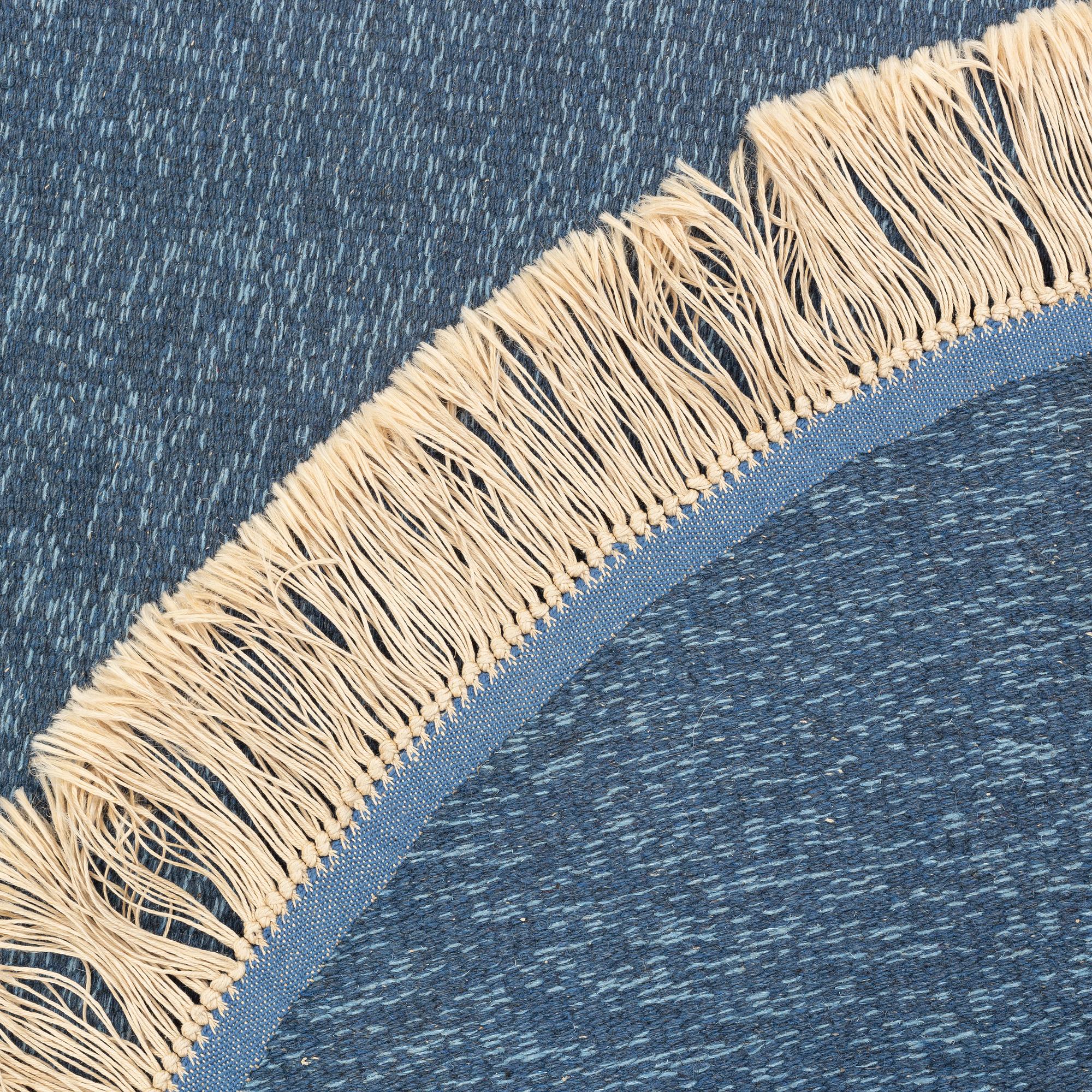 A rug, diameter circa 188 cm.