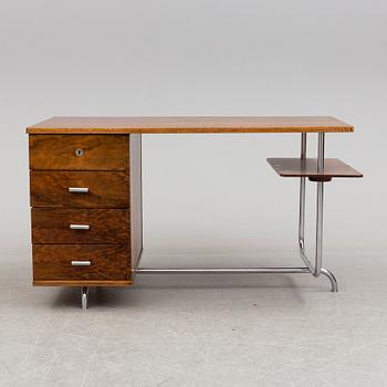 A 1930s writing desk by Jindrich Halabala and chair by Mart Stam.