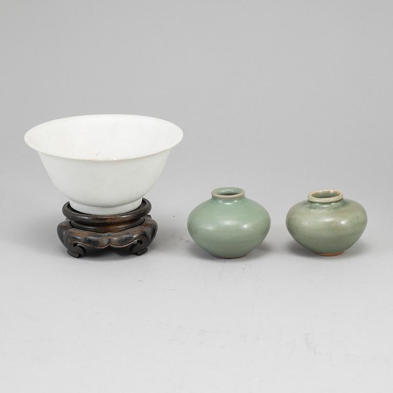 A white glazed bowl and two celadon glazed pots, Mingdynasty and older, shipwreck.