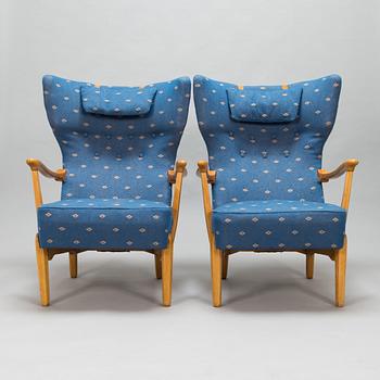 Lasse Ollinkari, a pair of 1947 designed armchairs manufactured by Vallilan Puuseppä Ltd.