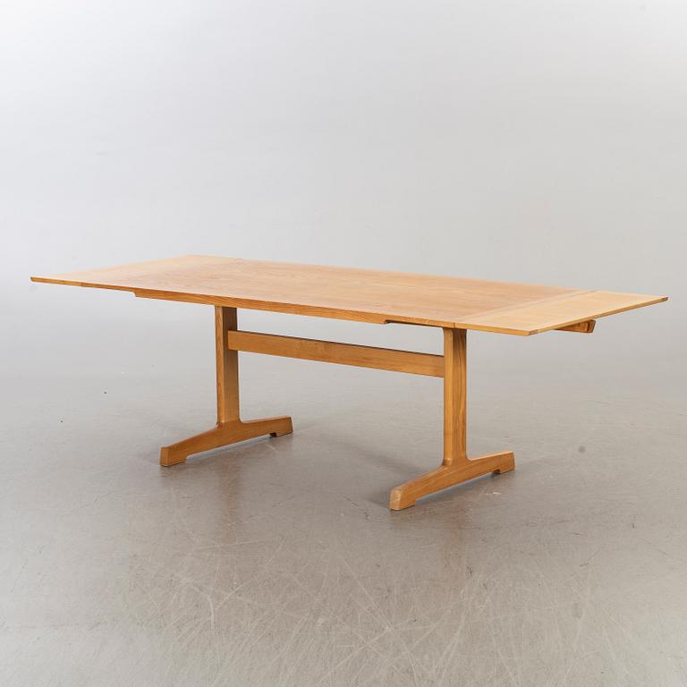 A late 20th century “Spisestue 594”, Ditte & Adrian Heath, France & Son dining table with 6 chairs.