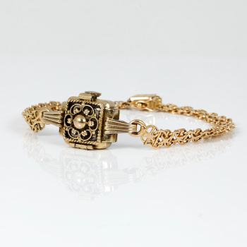DAMUR, delvis 18K guld, Siduna. Totalvikt ca 18 gram.