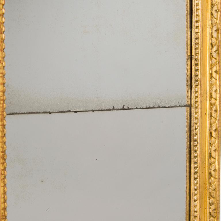 A mirror by Fredric Johan Foeder or Fjäder, (Master in Turku 1782-1832). Signed F.J.F and hallmarked in Turku.