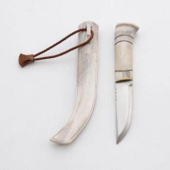 A reindeer horn knife by Bertil Fällman, signed.