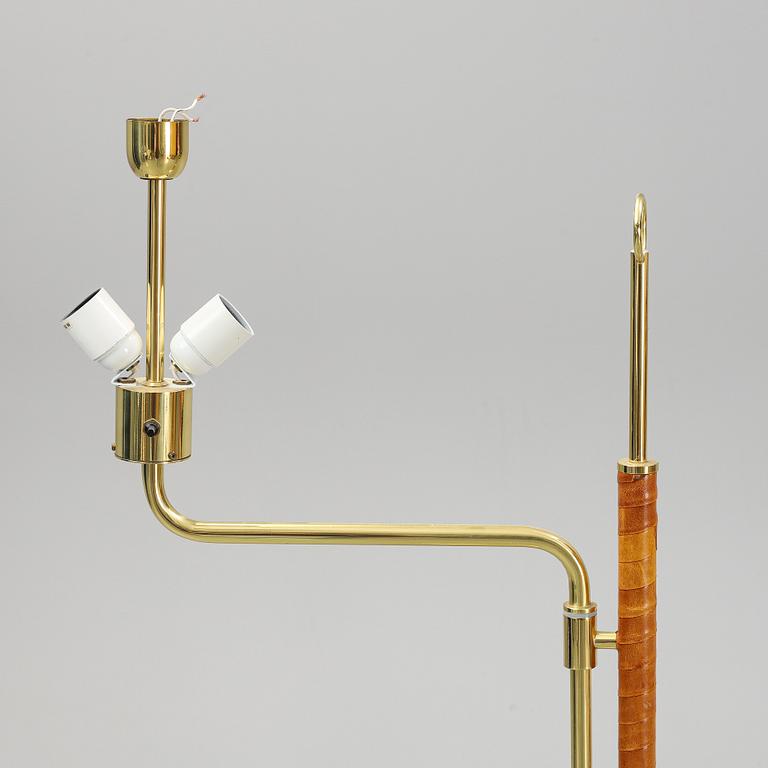 A pair of brass and leather floor lights, Örsjö industri, 21st century.