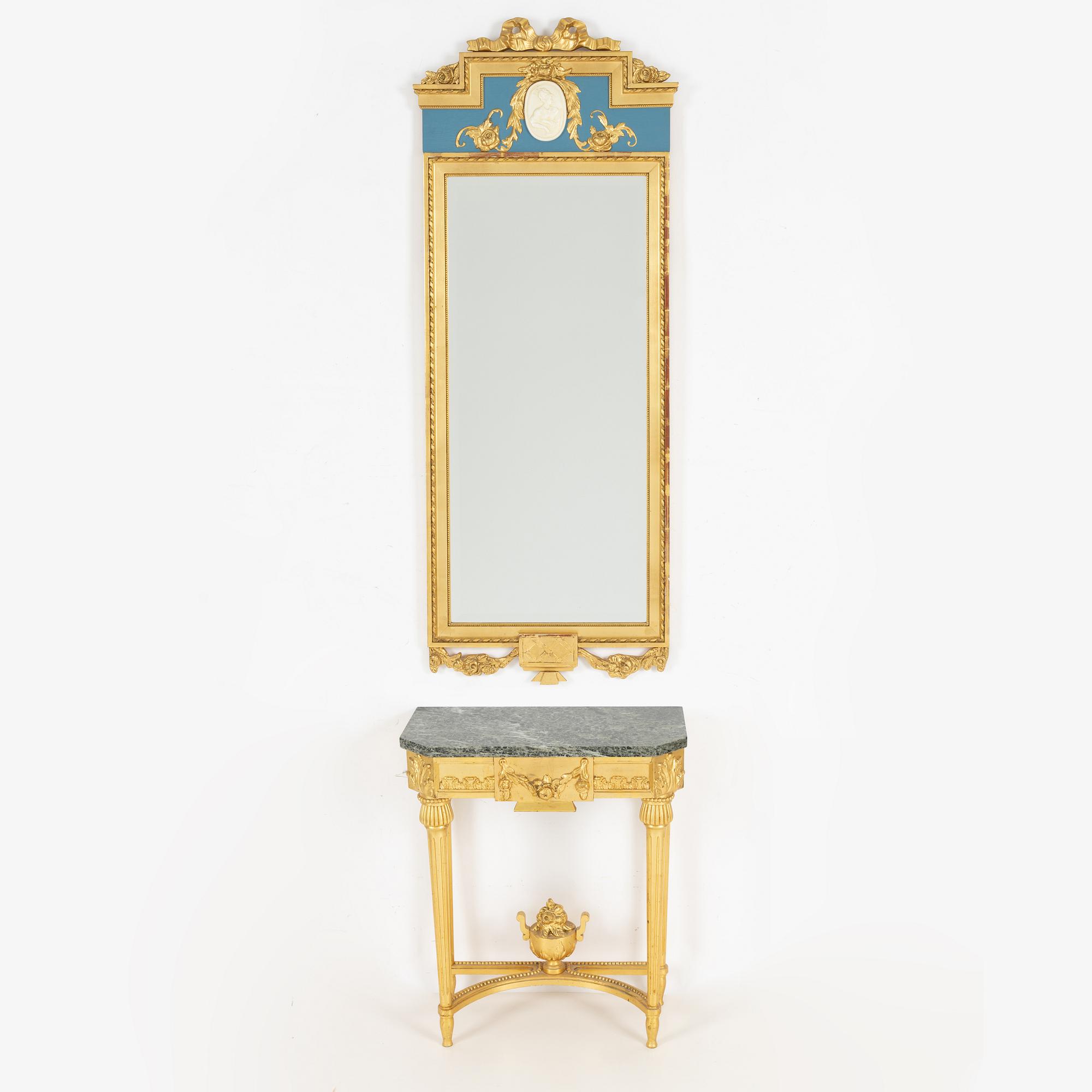 A Gustavian style console table and mirror, mid 20th century.