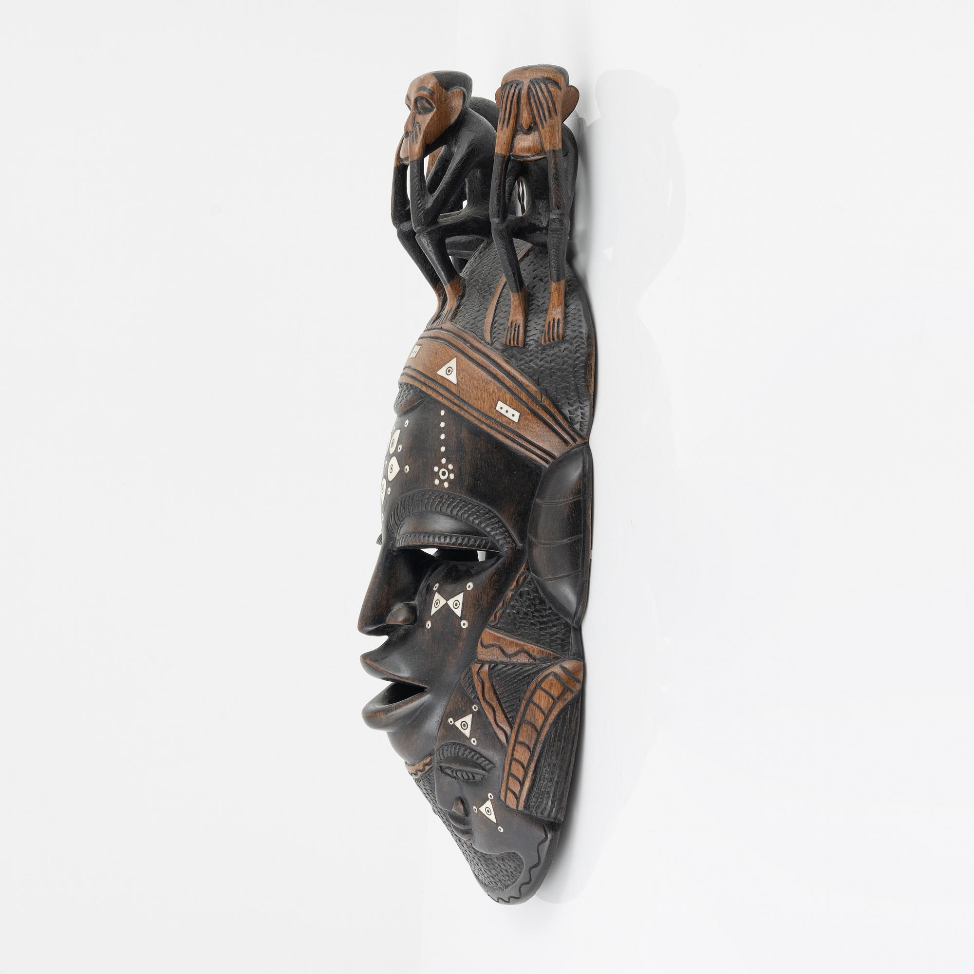 A wooden mask, Gambia, 21st Century.
