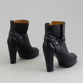 Black leather booties by Ralph Lauren.