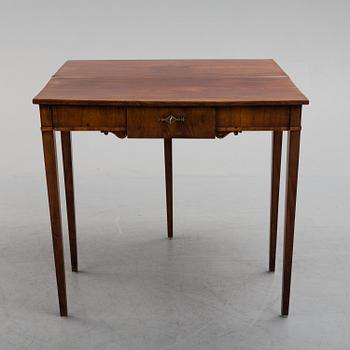 An early 19th century mahogany card table.