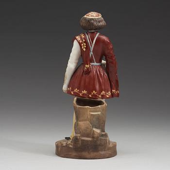 A Russyian biscuit figure of a Imerete, early 20th Century.