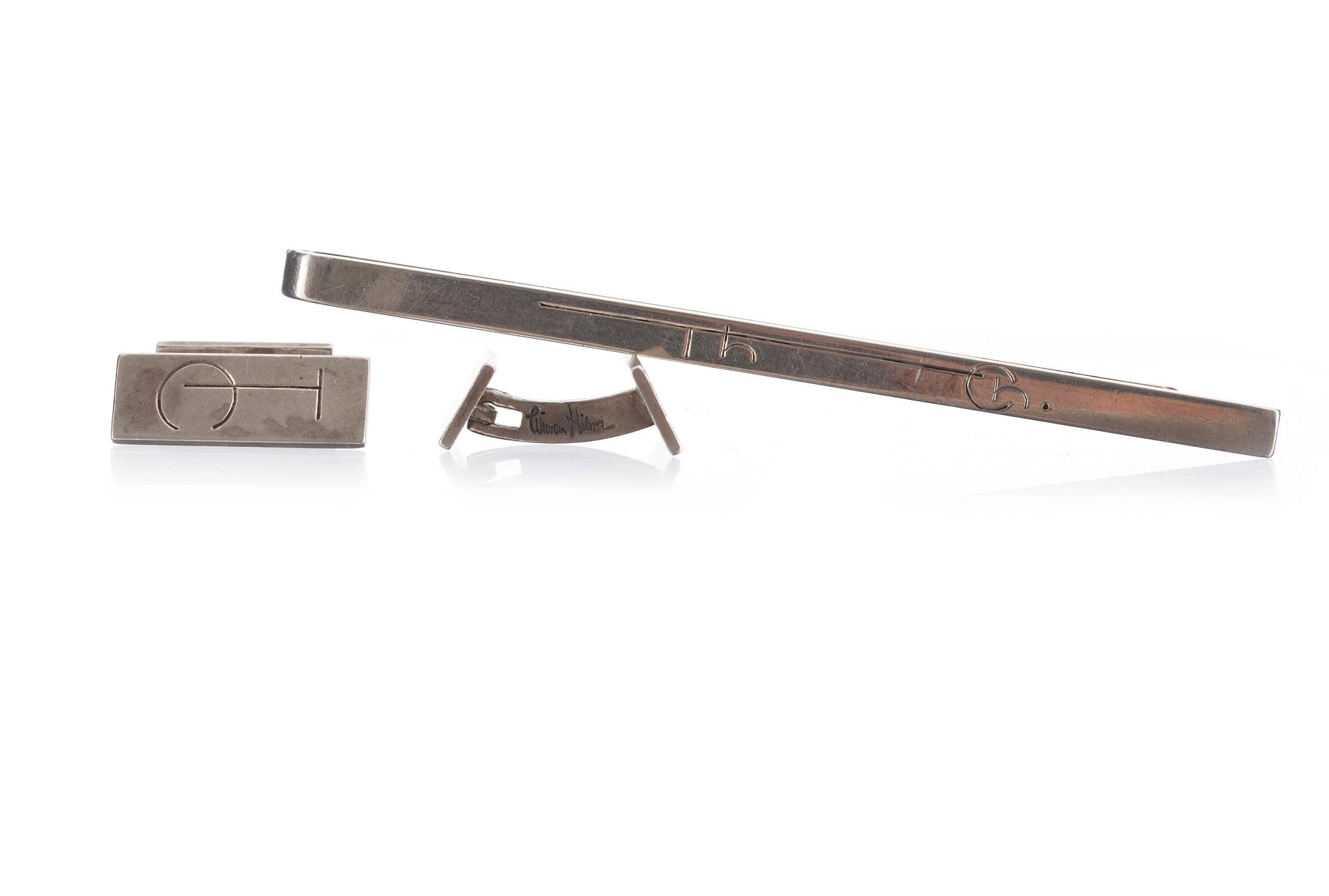 SLIPSNÅL och MANSCHETTKNAPPAR, ett par, silver, Wiwen Nilsson, 1939-45, vikt ca 20g.