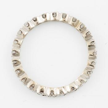 Alliansring, helallians, 14K vitguld med briljantslipade diamanter.