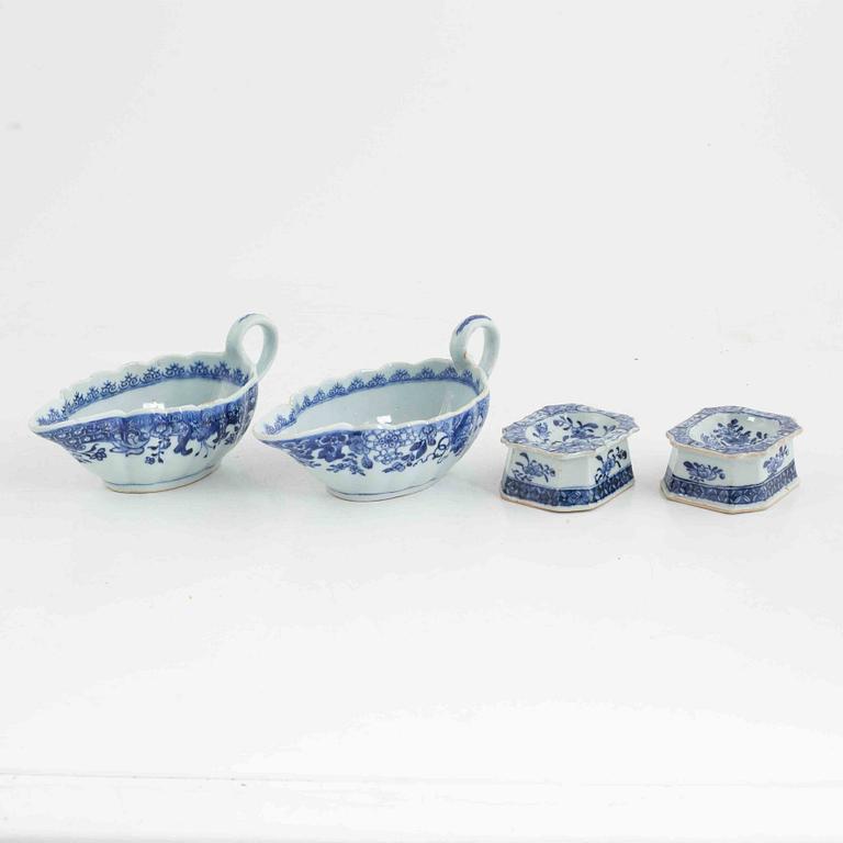 Two Chinese blue and white porcelain sauce boats and two salts, Qing dynasty, Qianlong (1736-95).