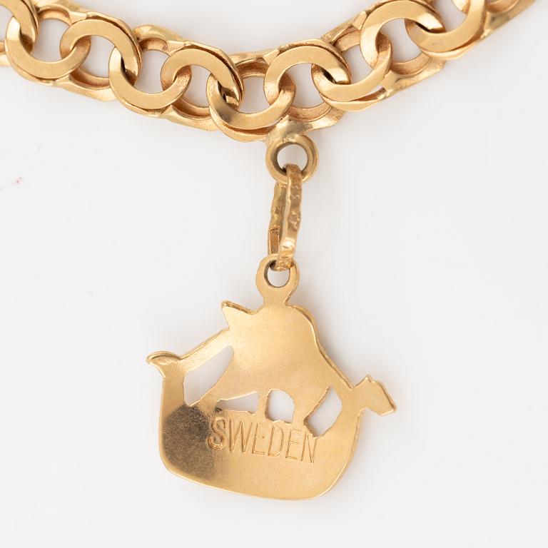 Bracelet, 18K gold, with charms.