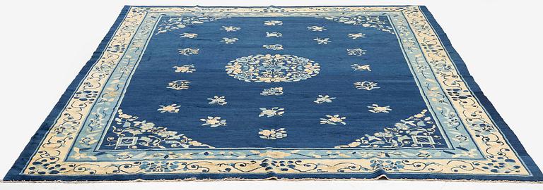 An antique Peking (Beijing) carpet, North China, c. 340 x 275 cm.