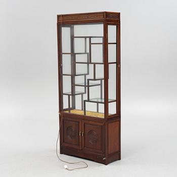 A Chinese hardwood cabinet, mid 20th century.