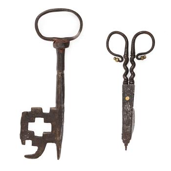 A set of a wrought iron key and wick snuffer, 17th - 18th century.