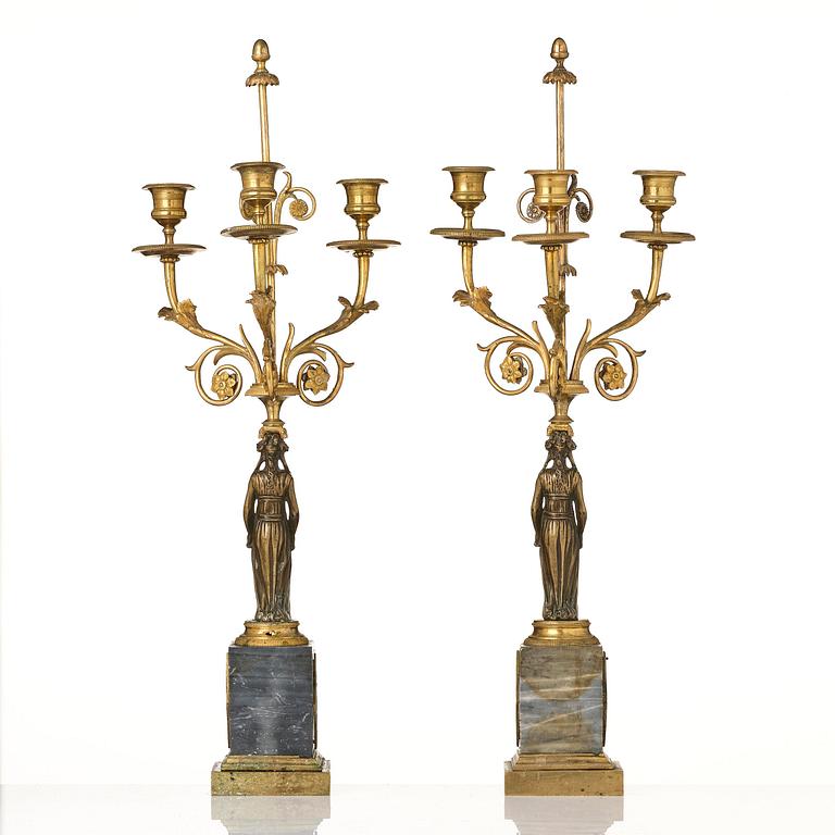 A pair of late Gustavian ormolu and marble three-light candelabra, Stockholm, late 18th century.