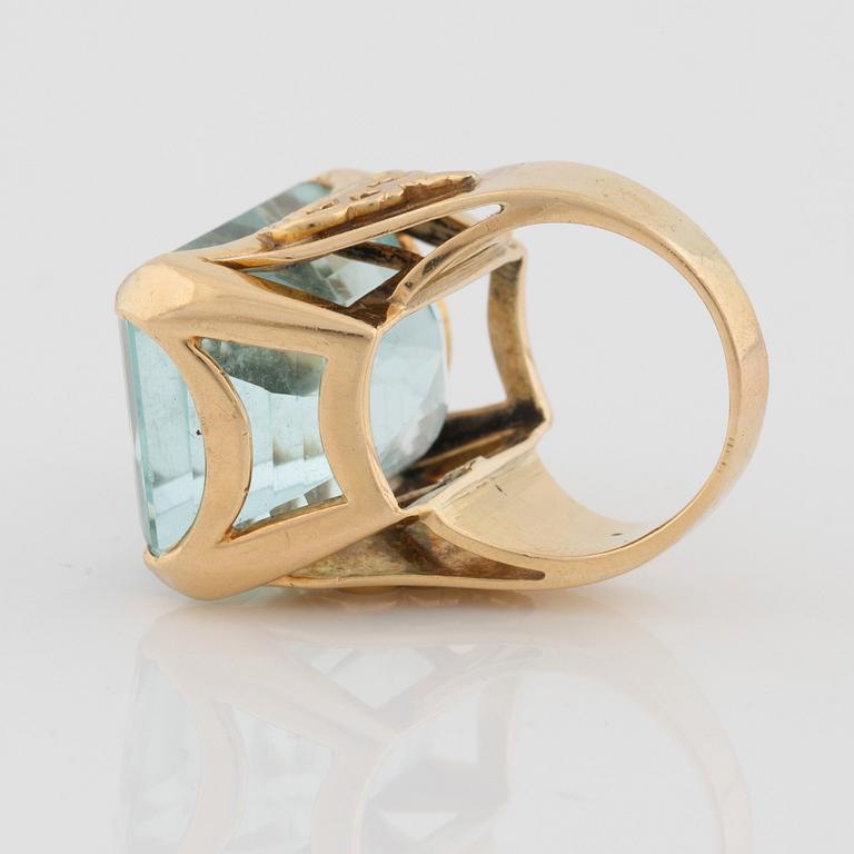 A circa 45.00 ct step cut aquamarine ring.
