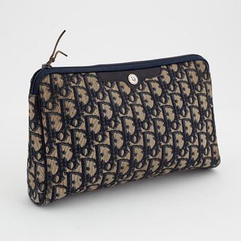 Christian Dior, a canvas handbag, toilet bag and key holder.