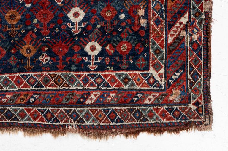 An antique Qashgai rug, 230 x 135 cm.