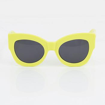 Karen Walker, a pair of neon green "Northern lights" sunglasses.