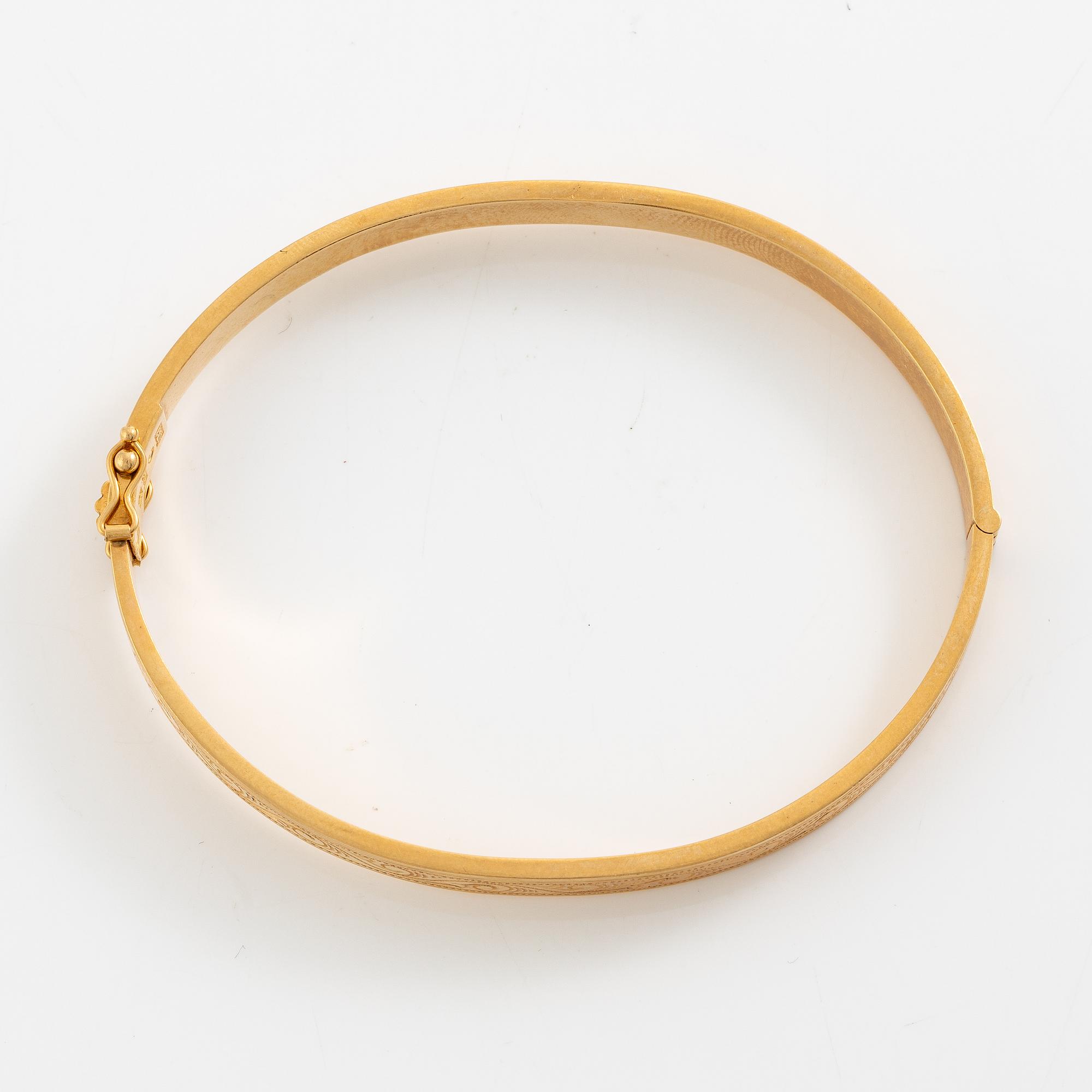 Arm ring, 18K gold.