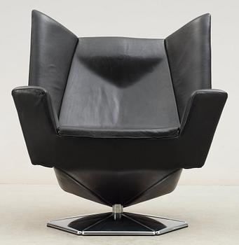 A Voitto Haapalainen black artificial leather and steel 'Prisma' easy chair, Tehokaluste Oy.