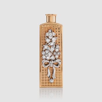 1095. A perfume bottle set with diamonds in a floral motif.