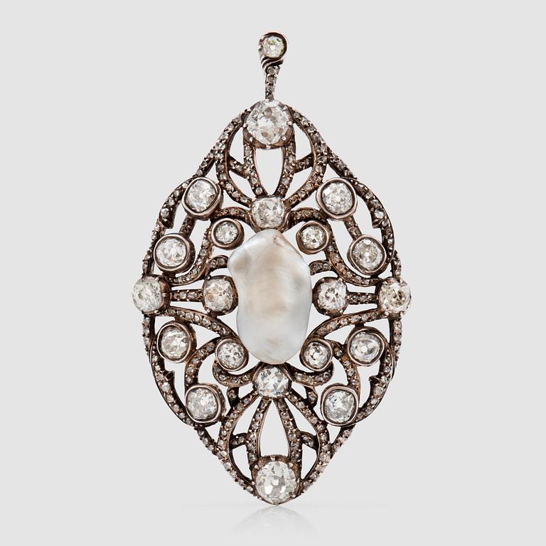 An old-cut diamond and possibly natural baroque pearl brooch/pendant. Total carat weight of diamonds circa 7.00 cts.