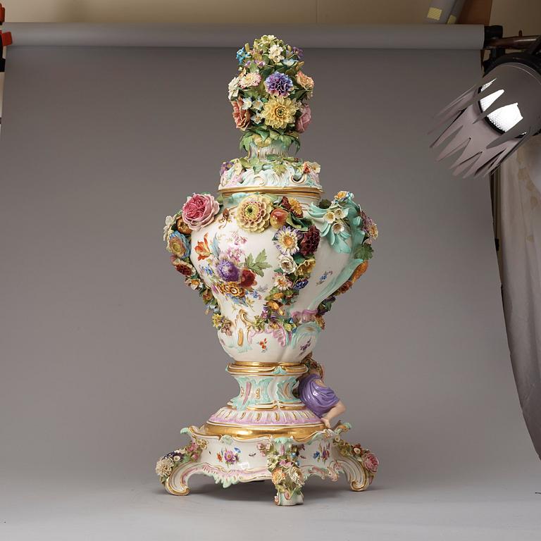 A large Meissen porcelain flower-encrusted pot-pourri vase, cover and stand, late 19th century.